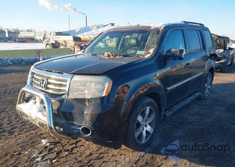 2012 Honda Pilot Touring z USA, uszkodzony, nr VIN 5FNYF4H92CB010997
